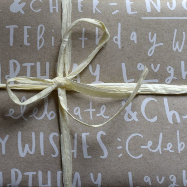 Birthday wishes writing kraft wrap with rafia ribbon